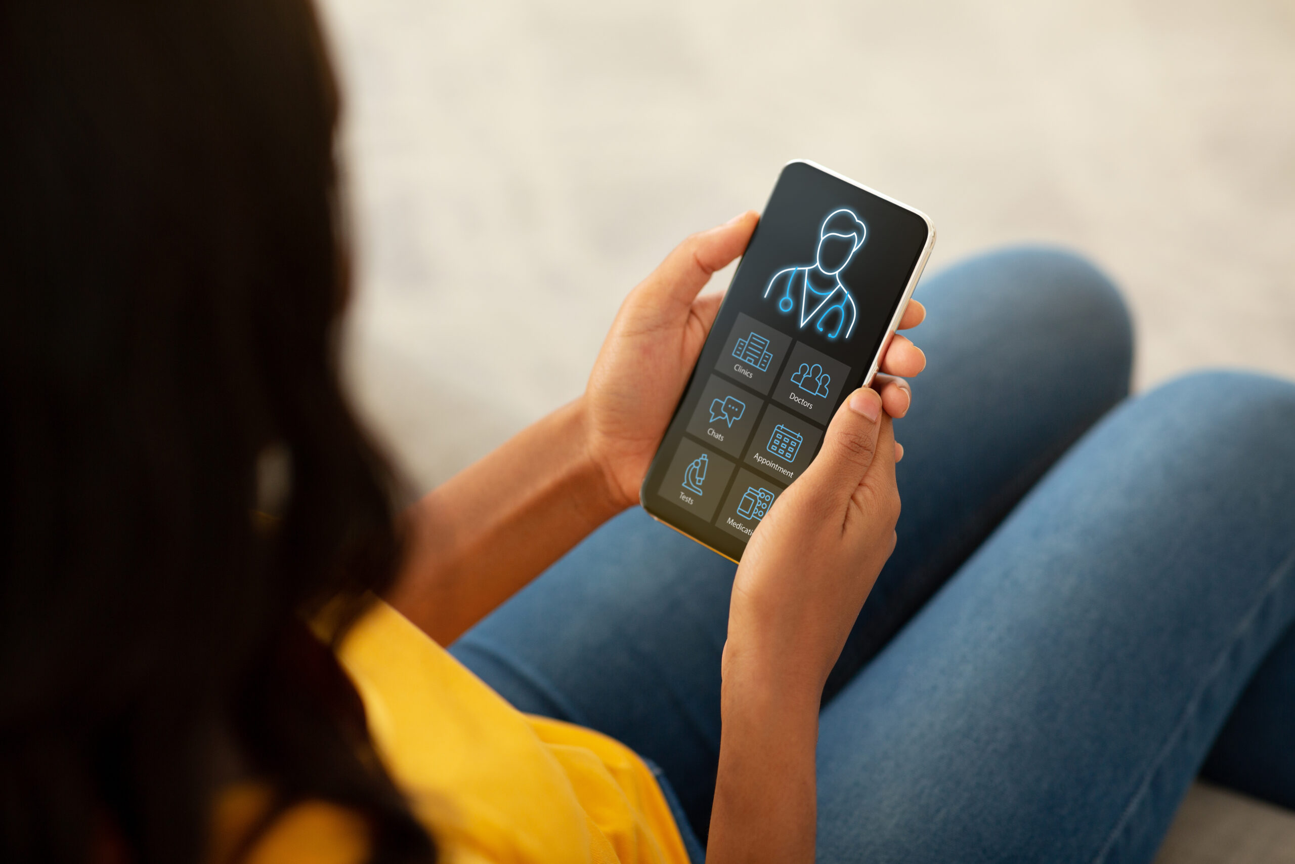 A woman checking her apppointment details via her smart phone. AdobeStock_476604365 from Adobe stock photos from https://stock.adobe.com/uk/