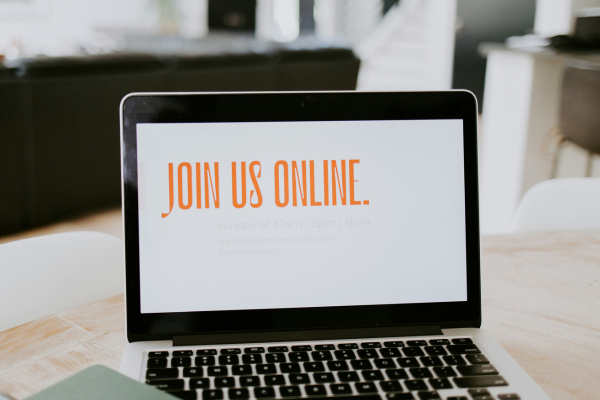Image of a laptop with words on screen that say Join Us Online.
